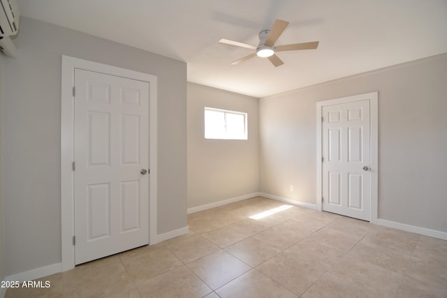 3640 W Garfield St, Phoenix, AZ 85009 - unfurnished bedroom featuring baseboards, light tile patterned floors, and a ceiling fan
