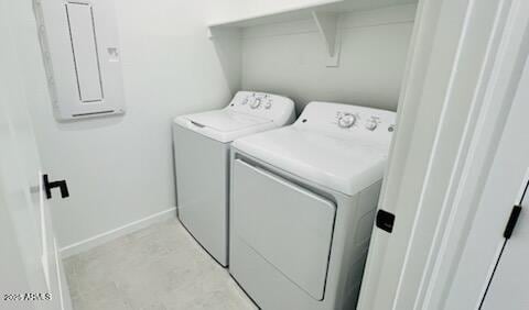 25137 W Wayland Dr, Buckeye, AZ 85326 - laundry room with washing machine and dryer, electric panel, and baseboards