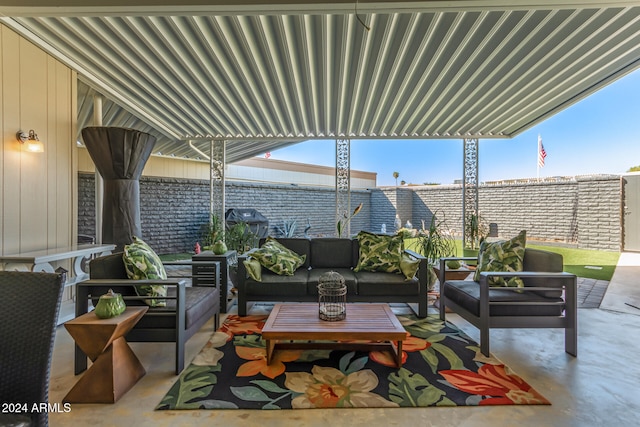 view of patio featuring an outdoor living space and a grill