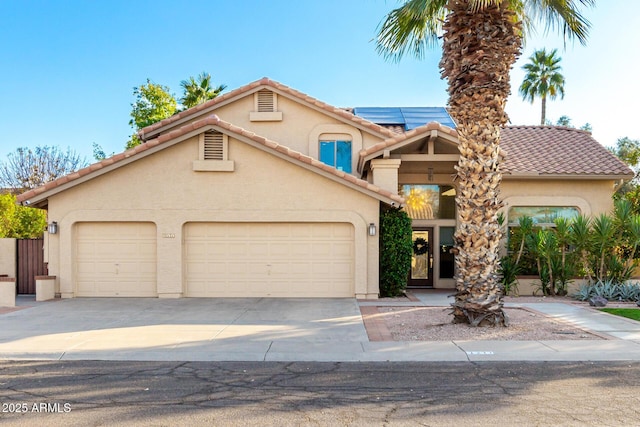 view of front of property featuring a garage