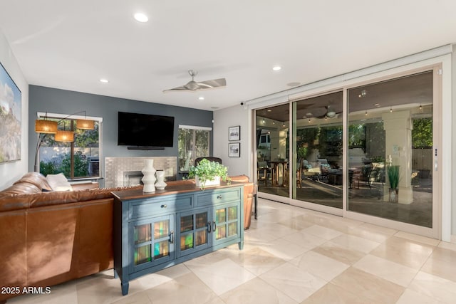 living room with ceiling fan