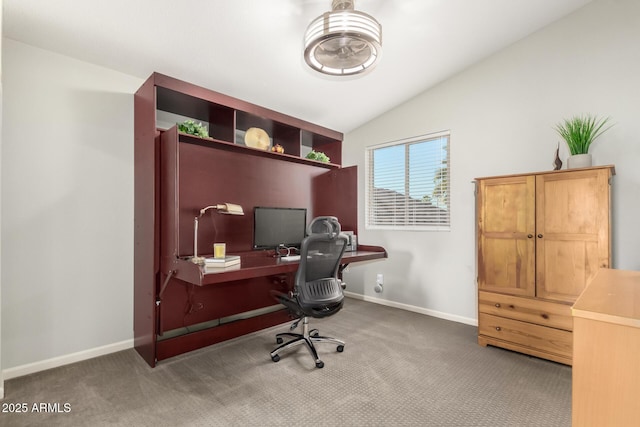 office space with vaulted ceiling and carpet floors