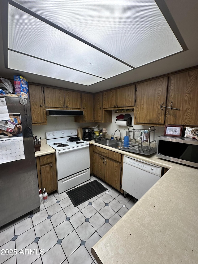 kitchen with appliances with stainless steel finishes and sink