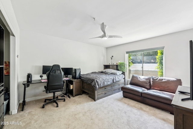 7214 E Royal Palm Rd, Scottsdale, AZ 85258 - carpeted bedroom with a desk and ceiling fan