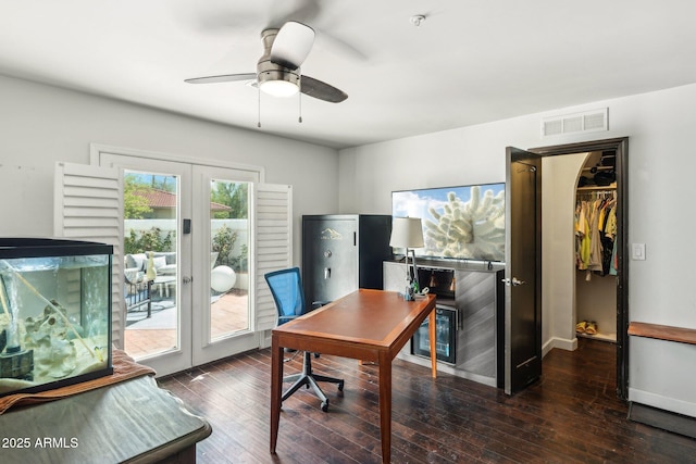 7214 E Royal Palm Rd, Scottsdale, AZ 85258 - office featuring french doors, a ceiling fan, hardwood / wood-style flooring, and baseboards