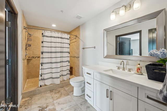 7214 E Royal Palm Rd, Scottsdale, AZ 85258 - bathroom featuring vanity, toilet, and recessed lighting