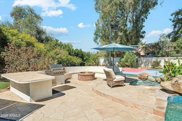 7214 E Royal Palm Rd, Scottsdale, AZ 85258 - view of patio with a fire pit