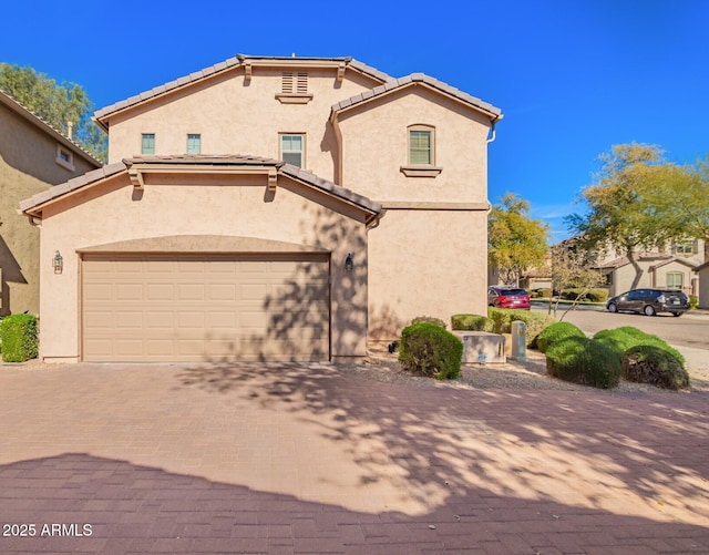 view of front of property featuring a garage