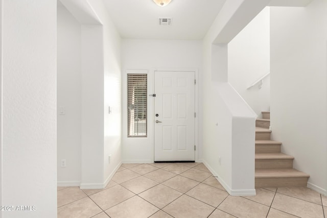 view of tiled foyer entrance