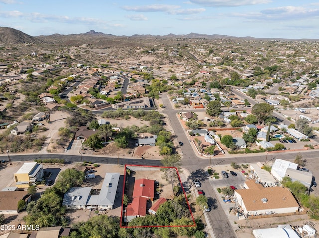drone / aerial view featuring a mountain view and a residential view