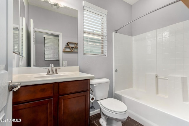 full bathroom featuring hardwood / wood-style floors, vanity, toilet, and bathing tub / shower combination