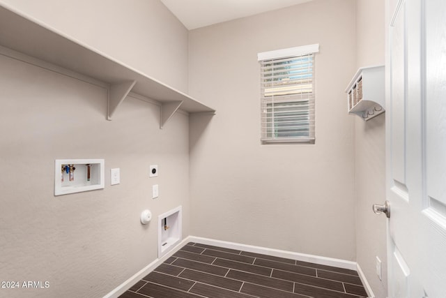 laundry area featuring washer hookup, electric dryer hookup, hookup for a gas dryer, and dark wood-type flooring