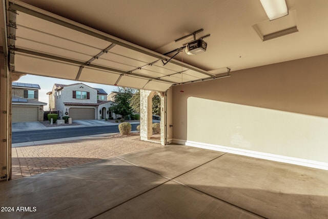 garage featuring a garage door opener