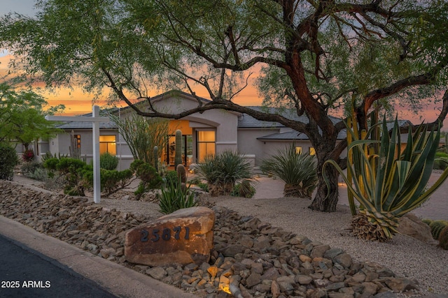 view of front of home featuring stucco siding