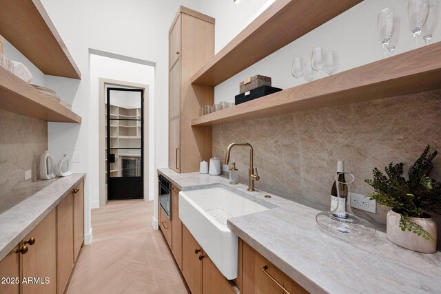 laundry room with a sink