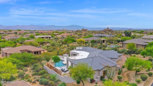 drone / aerial view featuring a mountain view and a residential view