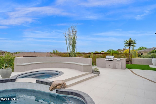 pool featuring exterior kitchen, a patio, an in ground hot tub, a grill, and fence