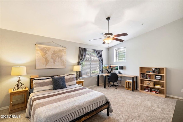 bedroom featuring light carpet, baseboards, and vaulted ceiling