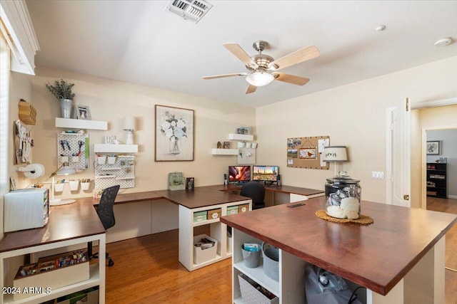 home office featuring ceiling fan and light wood-type flooring