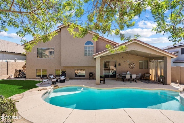 view of pool featuring a patio area