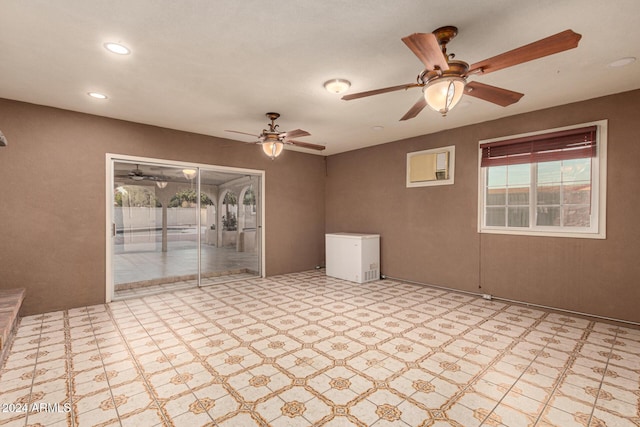 unfurnished room featuring a wealth of natural light