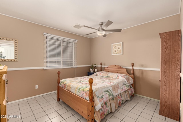 bedroom featuring ceiling fan and light tile patterned floors