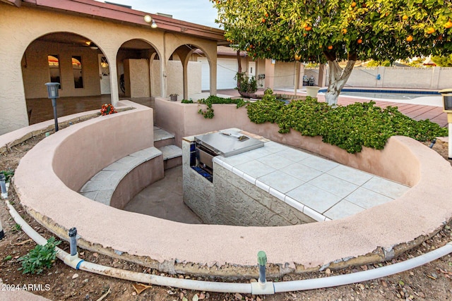 view of patio / terrace featuring a pool