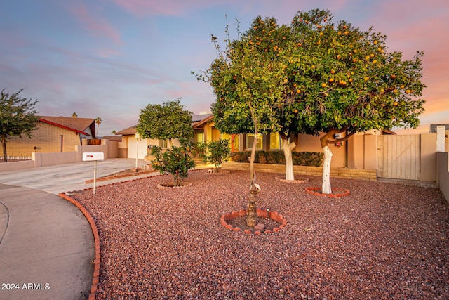 view of property hidden behind natural elements