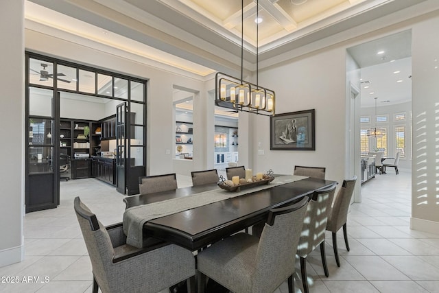 dining space featuring baseboards, an inviting chandelier, light tile patterned flooring, a towering ceiling, and beamed ceiling