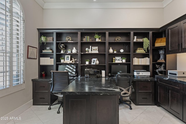 office area featuring light tile patterned flooring and ornamental molding