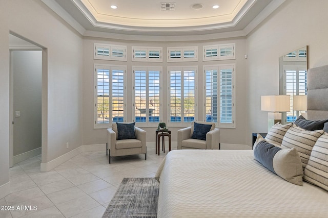 bedroom featuring light tile patterned floors, visible vents, multiple windows, and baseboards