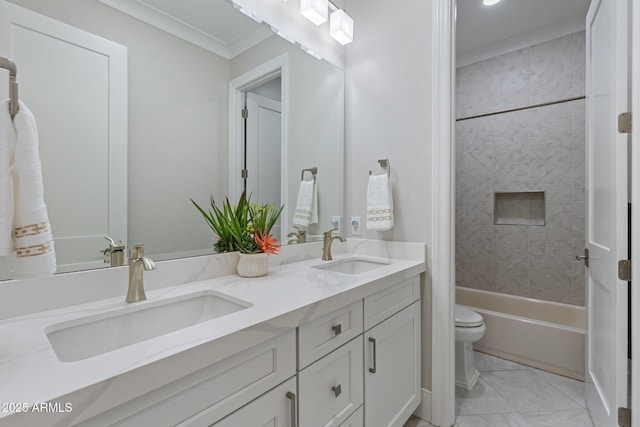 full bath featuring a sink, toilet, ornamental molding, and double vanity