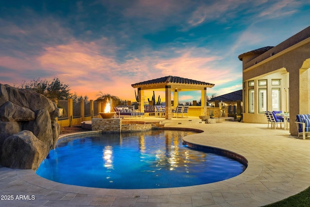 view of pool featuring a patio area and a fenced in pool