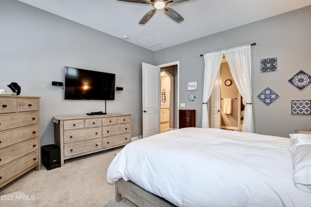 bedroom with light colored carpet and ceiling fan