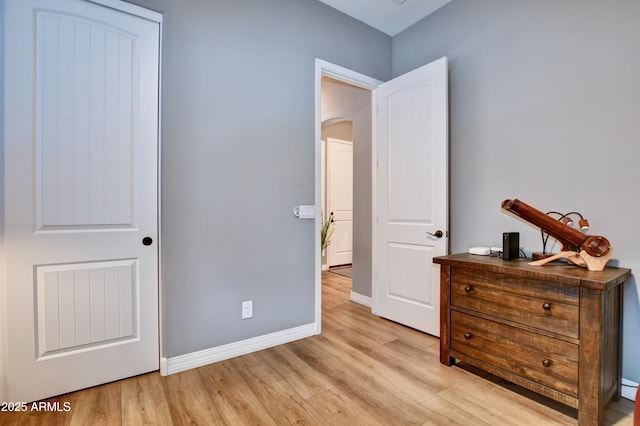 bedroom featuring light hardwood / wood-style floors