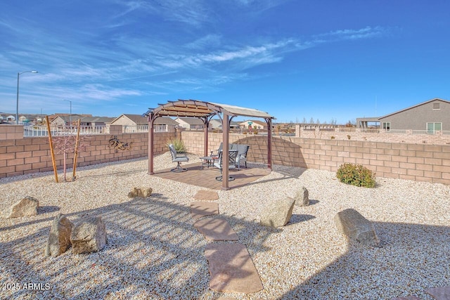 view of yard featuring a pergola and a patio