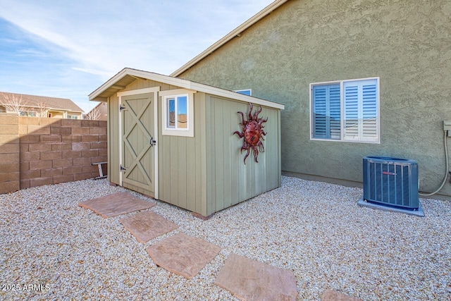 view of outdoor structure with central AC unit