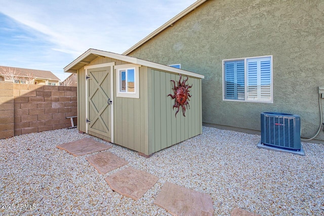 view of outbuilding featuring central AC unit