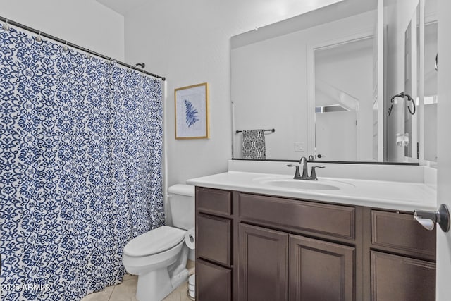 full bathroom featuring tile patterned floors, toilet, and vanity