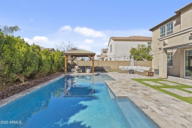 view of swimming pool featuring a fenced in pool, an outdoor living space, fence, a gazebo, and a patio