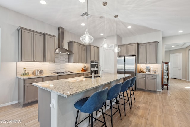 19045 N 269th Dr, Buckeye, AZ 85396 - kitchen featuring gray cabinetry, wall chimney range hood, stainless steel appliances, and recessed lighting