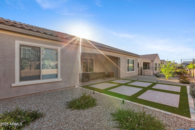 19045 N 269th Dr, Buckeye, AZ 85396 - rear view of property with a patio, a gate, a tiled roof, and stucco siding