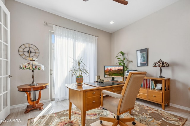 19045 N 269th Dr, Buckeye, AZ 85396 - office area with a ceiling fan, baseboards, and light wood-type flooring