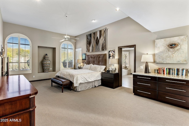 bedroom with ceiling fan and light colored carpet