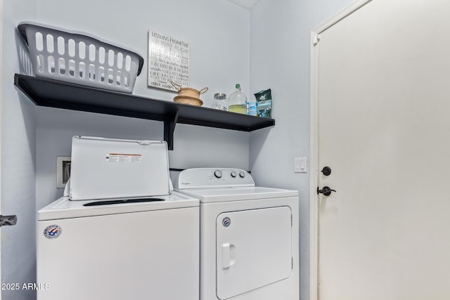 laundry room with washer and dryer