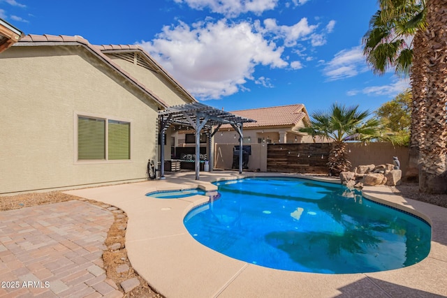 view of swimming pool featuring a pergola and a patio