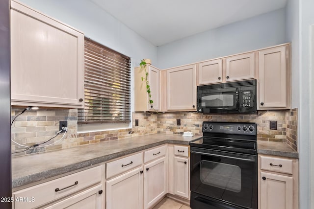 kitchen featuring light tile patterned floors, decorative backsplash, and black appliances