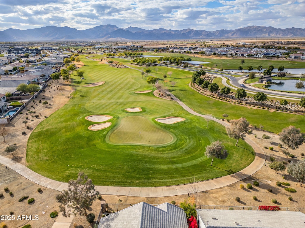 drone / aerial view featuring a water and mountain view