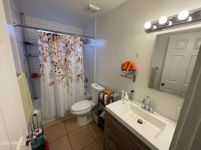 full bathroom with toilet, tile patterned floors, shower / bath combo, and vanity