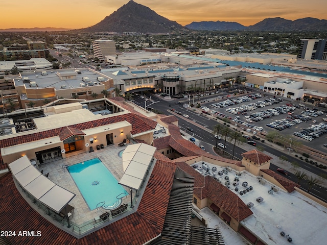 aerial view at dusk with a mountain view